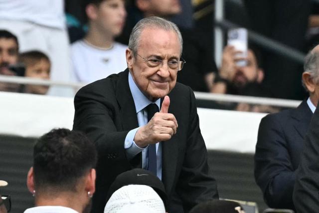 (FILES) President of Real Madrid Florentino Perez gives a thumbs-up to the fans ahead of the FIFA Club World Cup 2025 round of 16 football match between Spain's Real Madrid and Italy's Juventus at the Hard Rock Stadium in Miami on July 1, 2025. Real Madrid president Florentino Perez said on November 23, 2025 he plans to allow outside investors to buy a stake in the club for the first time, in order to "preserve and increase the value" of the Spanish giants. The arrival of a minority shareholder, who would hold "five percent or a maximum of 10 percent" of the club, would represent a significant change in the economic structure of Real Madrid. (Photo by Chandan Khanna / AFP)