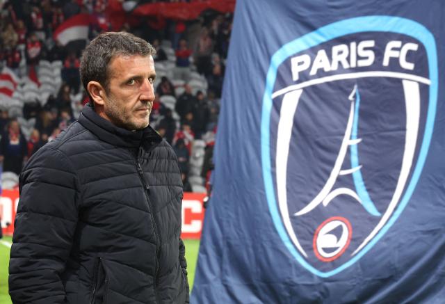 Paris FC's French head coach Stephane Gilli looks on before the start of the French L1 football match between Lille (LOSC) and Paris FC at the Stade Pierre-Mauroy in Villeneuve-d'Ascq, northern France, on November 23, 2025. (Photo by Francois LO PRESTI / AFP)