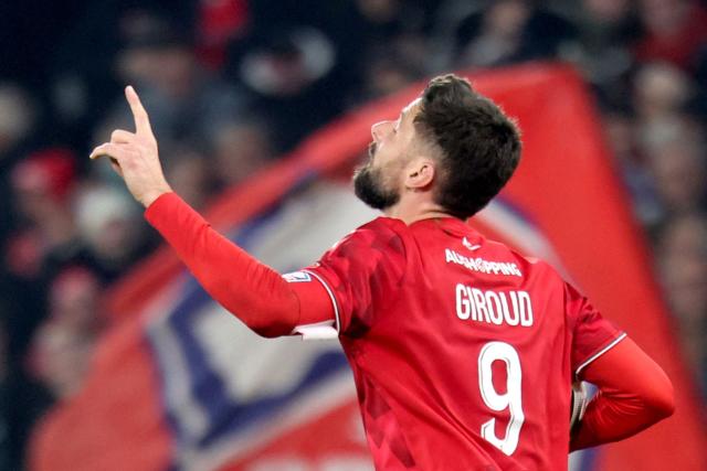 Lille's French forward #09 Olivier Giroud celebrates after scoring a goal during the French L1 football match between Lille (LOSC) and Paris FC at the Stade Pierre-Mauroy in Villeneuve-d'Ascq, northern France, on November 23, 2025. (Photo by Francois LO PRESTI / AFP)