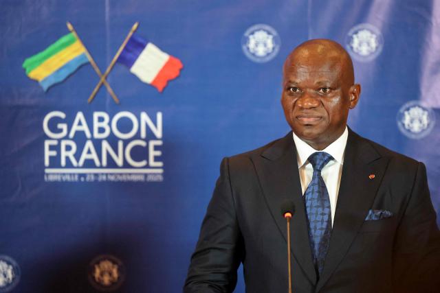 Gabon's President Brice Oligui Nguema holds a joint press conference with France's President following their meeting in Libreville on November 23, 2025. (Photo by Ludovic MARIN / AFP)