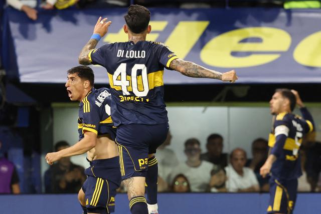Boca Juniors' defender #40 Lautaro Di Lollo celebrates scoring his team's first goal during the Argentine Professional Football League 2025 Clausura Tournament round of 16 match between Boca Juniors and Talleres de Cordoba at La Bombonera Stadium in Buenos Aires on November 23, 2025. (Photo by ALEJANDRO PAGNI / AFP)