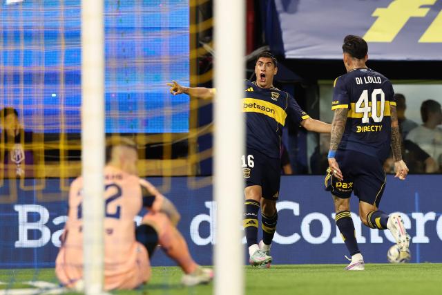 Boca Juniors' Uruguayan forward #16 Miguel Merentiel celebrates scoring his team's first goal  during the Argentine Professional Football League 2025 Clausura Tournament round of 16 match between Boca Juniors and Talleres de Cordoba at La Bombonera Stadium in Buenos Aires on November 23, 2025. (Photo by ALEJANDRO PAGNI / AFP)