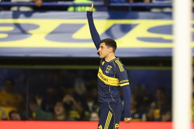 Boca Juniors' Uruguayan forward #16 Miguel Merentiel celebrates scoring his team's second goal during the Argentine Professional Football League 2025 Clausura Tournament round of 16 match between Boca Juniors and Talleres de Cordoba at La Bombonera Stadium in Buenos Aires on November 23, 2025. (Photo by ALEJANDRO PAGNI / AFP)