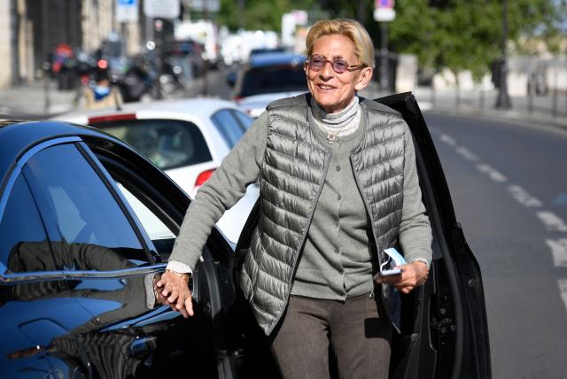 (FILES) Isabelle Balkany, the wife of Levallois' former mayor Patrick Balkany, arrives for a hearing at the Court of Cassation in Paris on May 5, 2021. The trial of the Balkany couple over damages for money laundering related to tax fraud takes place in Paris, on November 26, 2025. (Photo by Bertrand GUAY / AFP)