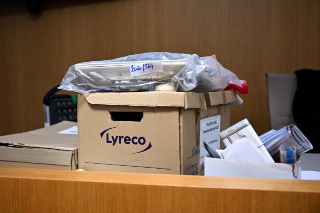 A photograph taken on November 24, 2025 shows evidences displayed in the courtroom of the Assize Court of the Landes department, in Mont-de-Marsan, in southwestern France, prior to the start of the trial of Maylis Daubon, charged with poisoning her two daughters, one of whom died. The trial of Maylis Daubon, 53, accused of poisoning her two daughters, one of whom died, by drugging them, then attempting to have their father murdered from prison, is set to open on November 24. Maylis Daubon has maintained since her indictment and imprisonment in January 2022 that her eldest daughter, who died at the age of 18, committed suicide (Photo by Gaizka IROZ / AFP)