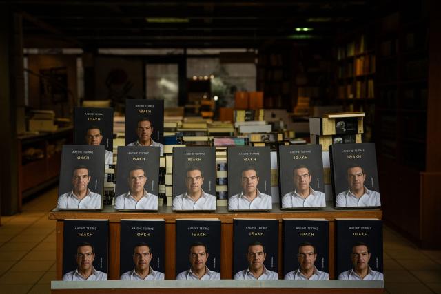A photograph taken on November 24, 2025 shows the new book by Greek former Prime Minister Alexis Tsipras displayed in a bookshop in Athens, on the day of its release. Greek former Prime Minister Alexis Tsipras published a long-awaited memoir ten years after a traumatic management of the country's debt crisis, as he reportedly mulls a political comeback. (Photo by Angelos TZORTZINIS / AFP)