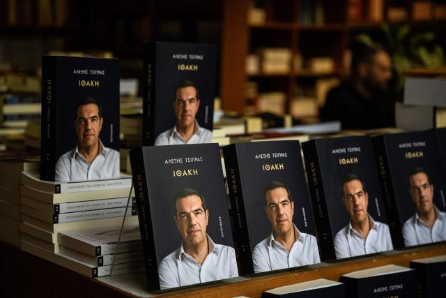 A photograph taken on November 24, 2025 shows the new book by Greek former Prime Minister Alexis Tsipras displayed in a bookshop in Athens, on the day of its release. Greek former Prime Minister Alexis Tsipras published a long-awaited memoir ten years after a traumatic management of the country's debt crisis, as he reportedly mulls a political comeback. (Photo by Angelos TZORTZINIS / AFP)