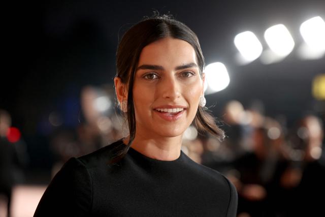 Indian model Saffron arrives on the red carpet of the inaugural Franca Fund Gala held on November 23, 2025 at the Museum of Islamic Art in Doha, Qatar. This milestone event is the latest initiative from the foundation, which honors the life and legacy ofthe late Franca Sozzani, the trailblazing editor-in-chief of Vogue Italia, by raising critical funds to drive research in preventative genomics. (Photo by Patrick BAZ / Qatar Creates / FACTSTORY) / Disclaimer: This document is neither produced nor endorsed by AFP. It is distributed under its issuer sole responsibility. Its reproduction is authorized in context without any distortion of content. If you have any question about this document, please contact its issuer.