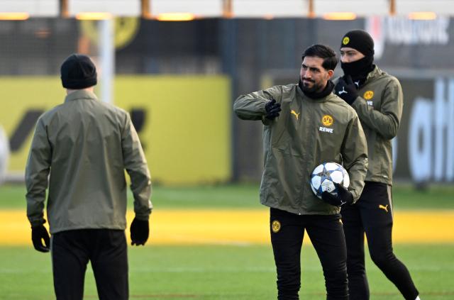 Dortmund's German midfielder #23 Emre Can warms up during a training session in Dortmund, western Germany on November 24, 2025, on the eve of the UEFA Champions League, league phase - Day 5 football match, Borussia Dortmund v Villarreal CF. (Photo by Ina FASSBENDER / AFP)