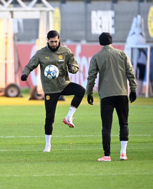 Dortmund's German midfielder #23 Emre Can warms up during a training session in Dortmund, western Germany on November 24, 2025, on the eve of the UEFA Champions League, league phase - Day 5 football match, Borussia Dortmund v Villarreal CF. (Photo by Ina FASSBENDER / AFP)