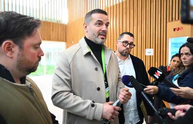 Ex-husband of Maylis Daubon, Yannick Reverdy speaks to press outside the courtroom of the Assize Court of the Landes department, in Mont-de-Marsan, in southwestern France, on November 24, 2025, during the trial of Maylis Daubon, charged with poisoning her two daughters, one of whom died. The trial of Maylis Daubon, 53, accused of poisoning her two daughters, one of whom died, by drugging them, then attempting to have their father murdered from prison, is set to open on November 24. Maylis Daubon has maintained since her indictment and imprisonment in January 2022 that her eldest daughter, who died at the age of 18, committed suicide. (Photo by Gaizka IROZ / AFP)