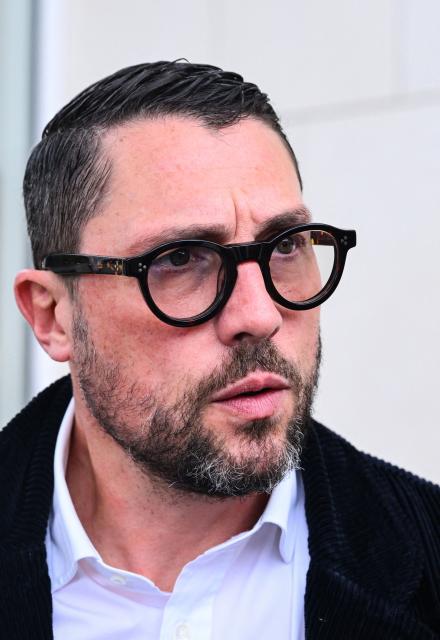 Lawyer for the civil parties Fabien Large (R) speaks to the press outside the courtroom of the Assize Court of the Landes department, in Mont-de-Marsan, in southwestern France, on November 24, 2025, during the trial of Maylis Daubon, charged with poisoning her two daughters, one of whom died. The trial of Maylis Daubon, 53, accused of poisoning her two daughters, one of whom died, by drugging them, then attempting to have their father murdered from prison, is set to open on November 24. Maylis Daubon has maintained since her indictment and imprisonment in January 2022 that her eldest daughter, who died at the age of 18, committed suicide. (Photo by Gaizka IROZ / AFP)