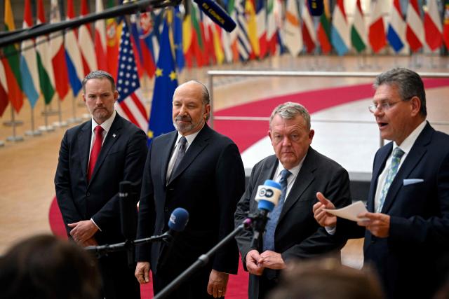 (From L) US' Trade Representative Jamieson Greer, US' Commerce Secretary Howard Lutnick, Denmark Foreign Affairs Minister Lars Lokke Rassmussen, and EU Commissioner for Trade and Economic Security, Interinstitutional relations and Transparency Maros Sefcovic deliver remarks to the press at the end of an EU Foreign Affairs Council about Trade in Brussels on November 24, 2025. (Photo by Nicolas TUCAT / AFP)