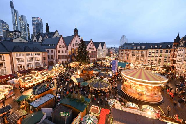 This picture shows an overview of the Christmas market at the central Roemer square in Frankfurt am Main, on November 24, 2025. (Photo by Kirill KUDRYAVTSEV / AFP)