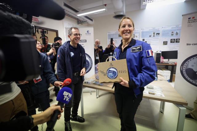 French astronaut Sophie Adenot speaks during a press conference regarding her departure for the International Space Station (ISS) in 2026, at the CNES, Centre national d'études spatiales (National Center for Space Studies) in Toulouse, southwestern France on November 24, 2025. (Photo by Valentine CHAPUIS / AFP)