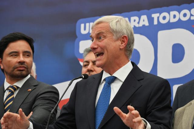 Chile's presidential candidate Jose Antonio Kast of the Republican party, speaks after a meeting with security advisers, in Santiago, on November 24, 2025. Leftist candidate Jeannette Jara and far-right leader Jose Antonio Kast will go head-to-head in Chile's presidential run-off after topping the first round of voting in an election dominated by fears of violent crime. (Photo by RODRIGO ARANGUA / AFP)