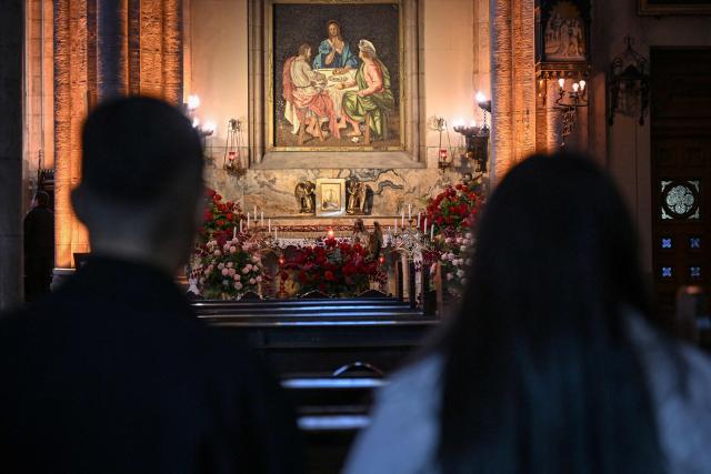 People visit Saint Anthony of Padua Church, ahead of the visit of Pope Leo XIV to Turkey, in Istanbul on November 24, 2025. (Photo by Ozan KOSE / AFP)