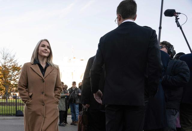 White House Press Secretary Karoline Leavitt walks back to the West Wing after speaking to journalists at the White House in Washington, DC, on November 24, 2025 (Photo by ANDREW CABALLERO-REYNOLDS / AFP)