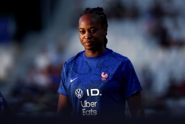 (FILES) France's forward #09 Marie-Antoinette Katoto warms up prior to the women's friendly football match between France and Brazil at the Stade des Alpes in Grenoble, central-eastern France, on June 27, 2025. France's forward Marie-Antoinette Katoto is ruled out with a left thigh issue for the double face-to-face against Sweden for third place in the Nations League, the federation says on November 24, 2025. (Photo by Alex MARTIN / AFP)