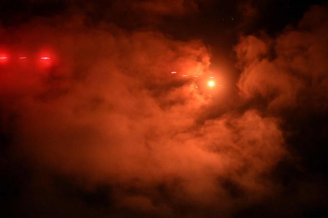 This photo shows Ukrainian air defence firing at Russian drones and missiles above Kyiv on November 25, 2025, amid the Russian invasion of Ukraine. Powerful explosions rocked Ukraine's capital Kyiv, an AFP journalist heard, as the air force issued a countrywide missile warning early November 25, 2025. (Photo by Sergei SUPINSKY / AFP)