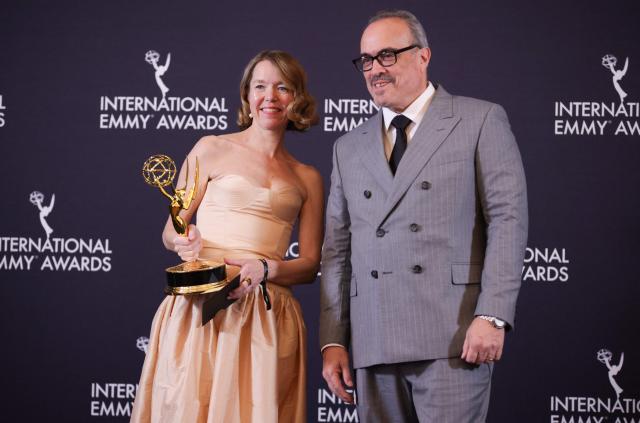 David US actor David Zayas stands by British actress Anna Maxwell Martin as she poses in the press room with the Best Performance by an Actress award for "Catch Me A Killer" during the 53rd International Emmy Awards Gala at the New York Hilton Midtown on November 24, 2025 in New York City. (Photo by Leonardo MUNOZ / AFP)