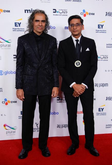 Indian filmmaker Imtiaz Ali (L) and Indian producer Mohit Chaudhary attend the 53rd International Emmy Awards Gala at the New York Hilton Midtown on November 24, 2025 in New York City. (Photo by Leonardo Munoz / AFP)