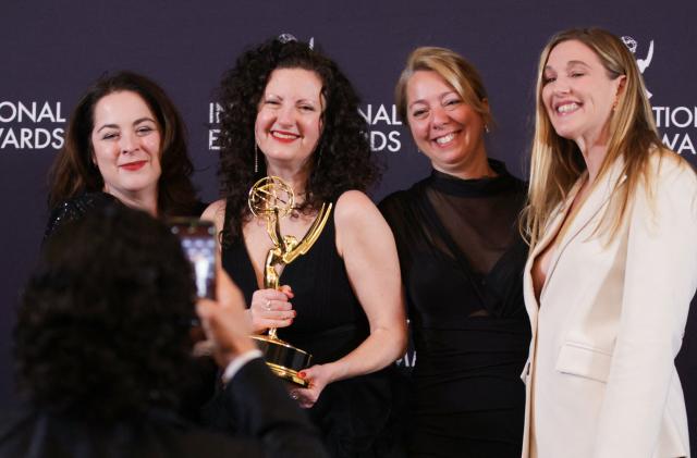 Canadian creator/producer Wendy Litner (2L) and Canadian producer Lauren Corber (2R) pose in the press room with the Short-Form Series award for "My Dead Mom" during the 53rd International Emmy Awards Gala at the New York Hilton Midtown on November 24, 2025 in New York City. (Photo by Leonardo MUNOZ / AFP)