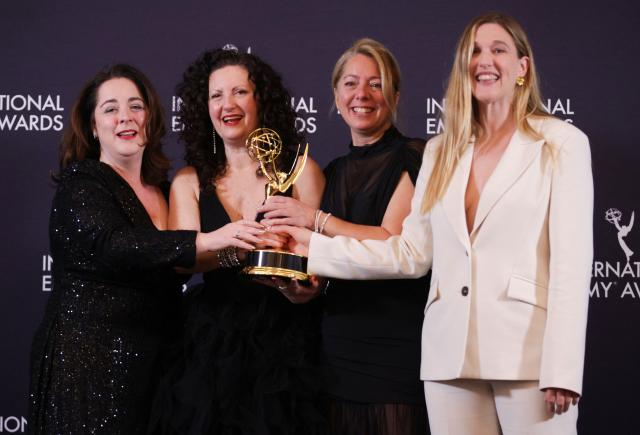 Canadian creator/producer Wendy Litner (2L) and Canadian producer Lauren Corber (2R) pose in the press room with the Short-Form Series award for "My Dead Mom" during the 53rd International Emmy Awards Gala at the New York Hilton Midtown on November 24, 2025 in New York City. (Photo by Leonardo MUNOZ / AFP)