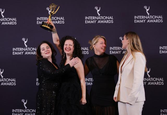 Canadian creator/producer Wendy Litner (2L) and Canadian producer Lauren Corber (2R) pose in the press room with the Short-Form Series award for "My Dead Mom" during the 53rd International Emmy Awards Gala at the New York Hilton Midtown on November 24, 2025 in New York City. (Photo by Leonardo MUNOZ / AFP)