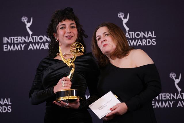 Lebanese/British producer/director Vanessa Bowles (L) and  editor Melanie Quigley (R) pose in the press room with the Current Affairs award for "Dispatches: Kill Zone: Inside Gaza" during the 53rd International Emmy Awards Gala at the New York Hilton Midtown on November 24, 2025 in New York City. (Photo by Leonardo MUNOZ / AFP)