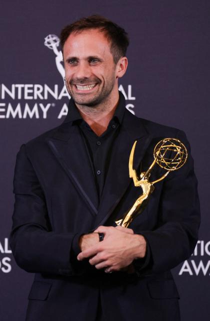 Spanish actor Oriol Pla poses in the press room with the Best Performance by an Actor award for "I, Addict" during the 53rd International Emmy Awards Gala at the New York Hilton Midtown on November 24, 2025 in New York City. (Photo by Leonardo MUNOZ / AFP)