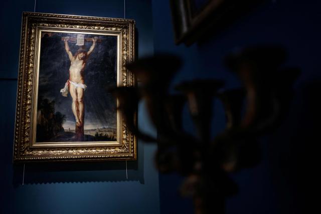 (FILES) This photograph taken on September 11, 2025 shows the painting "Christ on the cross" by Dutch painter Peter Paul Rubens, exhibited at the Osenat auction house in Fontainebleau, south of Paris. A long-lost painting by 17th-century Flemish master Peter Paul Rubens has been found in a Paris mansion, a French auctioneer said on September 10, 2025. The painting will be auctioned on November 30, 2025 at Osenat auction house in Fontainebleau. (Photo by Ian LANGSDON / AFP)