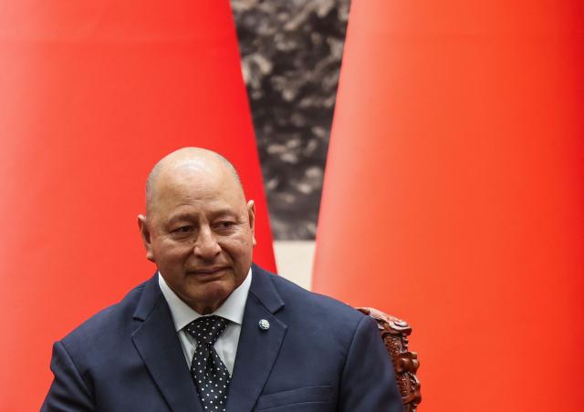 Tonga's King Tupou VI attends a signing ceremony with China’s President Xi Jinping (not pictured) at the Great Hall of the People in Beijing on November 25, 2025. (Photo by Maxim Shemetov / POOL / AFP)