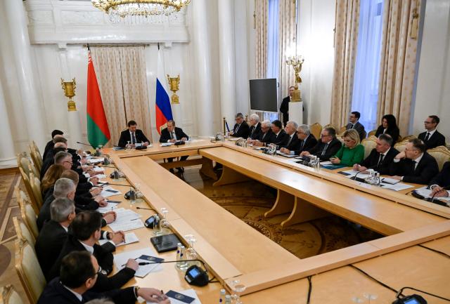 Russian Foreign Minister Sergei Lavrov and Belarusian Foreign Minister Maxim Ryzhenkov attend a joint meeting of the Boards of the Foreign Ministries of Russia and Belarus in Moscow on November 25, 2025. (Photo by Alexander NEMENOV / POOL / AFP)