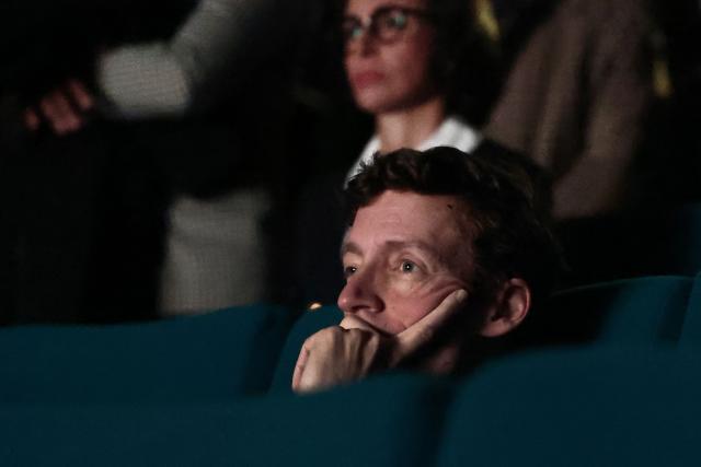 France's Education Minister Edouard Geffray looks on during a school screening of the movie "Capitaines !" as part of a visit to the Cinemas du Palais movie theatre to unveil new measures promoting film education, in Creteil, Paris suburb on November 25, 2025. (Photo by Thibaud MORITZ / AFP)