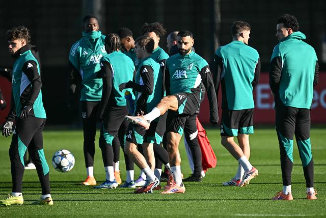 Liverpool's Egyptian striker #11 Mohamed Salah (C) attends a training session at the team's training ground in Kirkby, north Liverpool in north-west England, on November 25, 2025, on the eve of their UEFA Champions League league phase football match against PSV Eindhoven.  (Photo by Paul ELLIS / AFP)