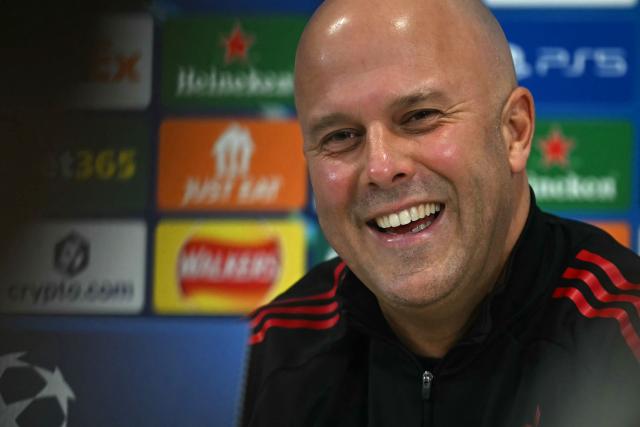 Liverpool's Dutch manager Arne Slot smiles during a press conference at Anfield in Liverpool, north-west England, on November 25, 2025, on the eve of their UEFA Champions League league phase football match against PSV Eindhoven.  (Photo by Paul ELLIS / AFP)