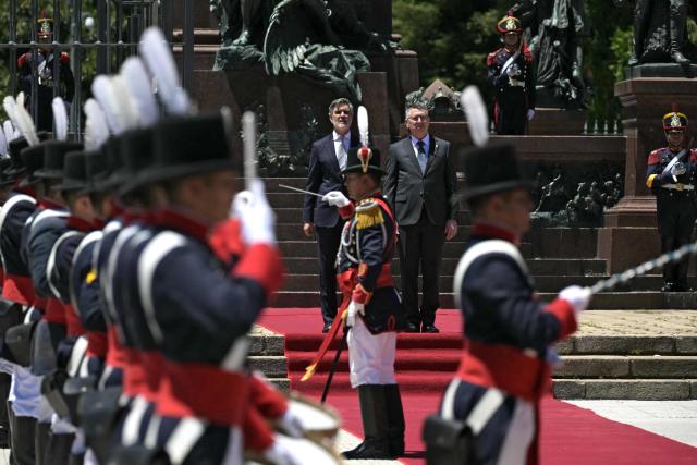 Israel's Foreign Minister Gideon Sa'ar (R) and Argentina's Secretary of International Economic Relations Fernando Brun take part in a wreath-laying ceremony in homage to Argentine national hero General Jose de San Martin in Buenos Aires on November 25, 2025. Sa'ar is in Argentina on official visit. (Photo by JUAN MABROMATA / AFP)