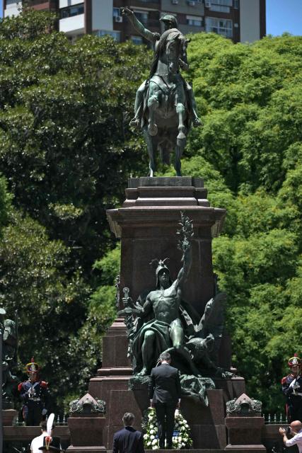 Israeli Foreign Minister Gideon Sa'ar (C) attends a wreath-laying ceremony in homage to Argentine national hero General Jose de San Martin in Buenos Aires on November 25, 2025, as part of his official visit to the country. (Photo by JUAN MABROMATA / AFP)