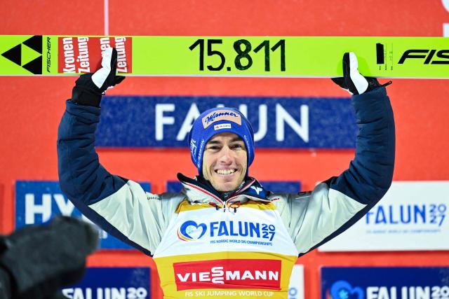 Austria's Stefan Kraft celebrates after breaking a new ski jumping record with the most points ever in the World Cup, after winning the Men's Individual HS95 competition of the ski jumping World Cup, in Falun, Sweden, on November 25, 2025. (Photo by Fredrik SANDBERG / TT NEWS AGENCY / AFP) / Sweden OUT