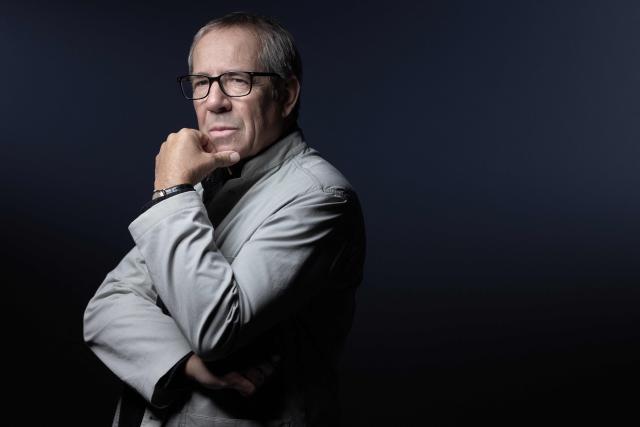French investigative journalist Frederic Ploquin poses during a photo session in Paris on November 24, 2025. (Photo by JOEL SAGET / AFP)