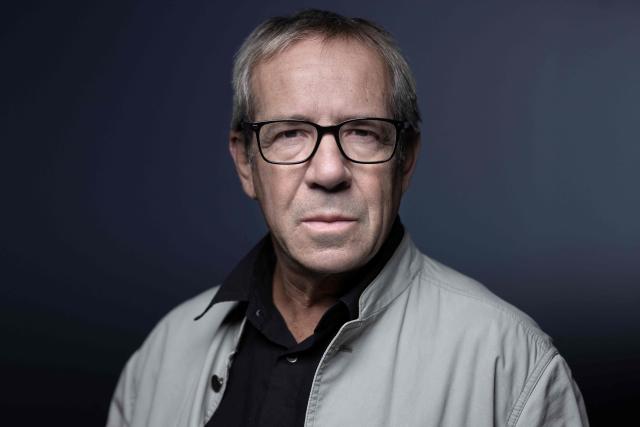 French investigative journalist Frederic Ploquin poses during a photo session in Paris on November 24, 2025. (Photo by JOEL SAGET / AFP)