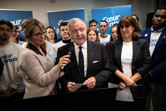 President of Business software publisher Cegid and Vice-President of French Football Federation (FFF) Jean-Michel Aulas (C) speaks during the inauguration of his campaign headquarters for Mayor of Lyon in France's 2026 municipal elections, in Lyon, central-eastern France, on November 25, 2025. (Photo by ARNAUD FINISTRE / AFP)