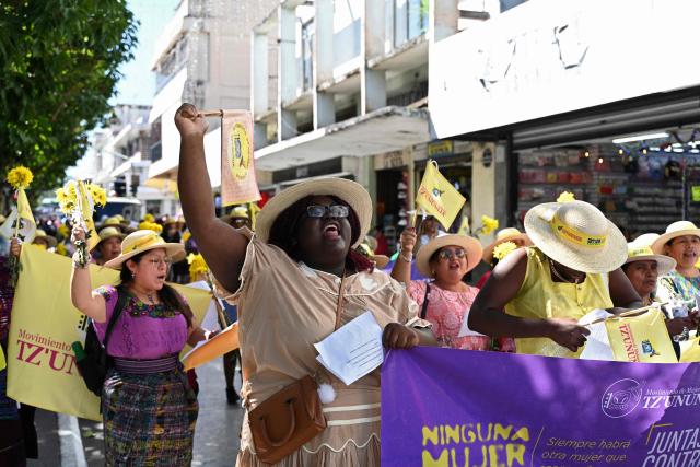 Women shout slogans during a demonstration on the International Day for the Elimination of Violence against Women in Guatemala City, on November 25, 2025. (Photo by Johan ORDONEZ / AFP)