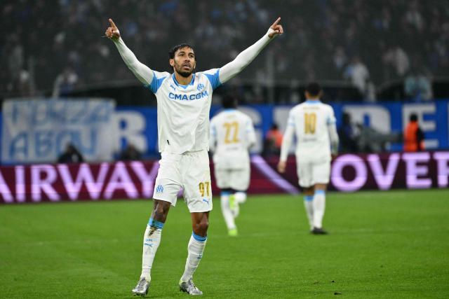 Marseille's Gabonese forward #97 Pierre-Emerick Aubameyang  celebrates after scoring his team's first goal during the UEFA Champions League, league phase - matchday 5, football match between Olympique de Marseille (OM) and Newcastle United FC at the Velodrome Stadium in Marseille, southeastern France, on November 25, 2025. (Photo by Christophe SIMON / AFP)