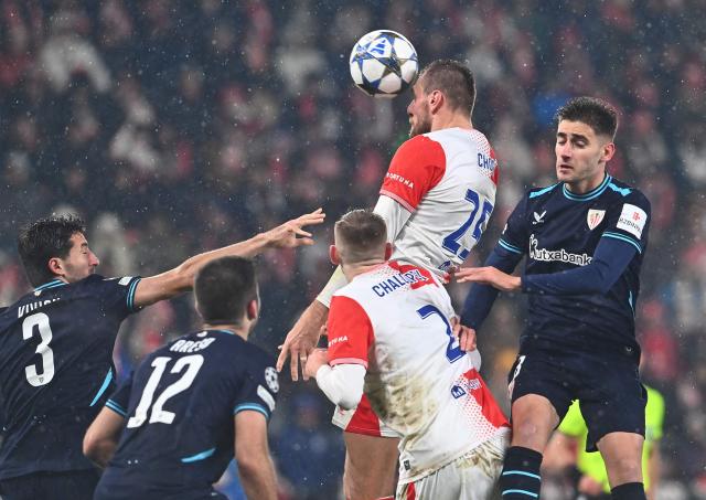 Slavia Prague's Czech forward #25 Tomas Chory heads the ball during the UEFA Champions League league phase day 5 football match between Slavia Praha and Athletic Bilbao in Prague, on November 25, 2025. (Photo by Michal Cizek / AFP)