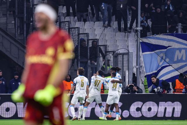 Marseille's players celebrate their second goal during the UEFA Champions League, league phase - matchday 5, football match between Olympique de Marseille (OM) and Newcastle United FC at the Velodrome Stadium in Marseille, southeastern France, on November 25, 2025. (Photo by Alex MARTIN / AFP)