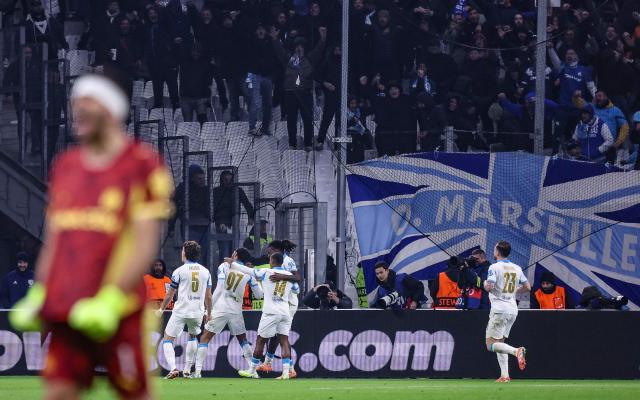Marseille's players celebrate their second goal during the UEFA Champions League, league phase - matchday 5, football match between Olympique de Marseille (OM) and Newcastle United FC at the Velodrome Stadium in Marseille, southeastern France, on November 25, 2025. (Photo by Alex MARTIN / AFP)