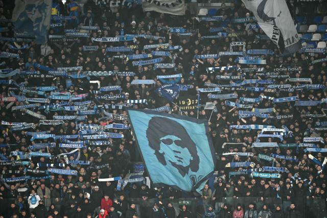 Napoli's supporters cheer during the UEFA Champions League - league phase day 5 football match between Napoli and Qarabag at the Diego Armando Maradona stadium in Naples on November 25, 2025. (Photo by Alberto PIZZOLI / AFP)
