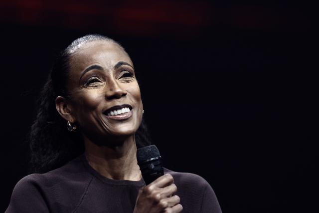 French television presenter Christine Kelly speaks on during "Face a vous - Les grands enjeux de demain" (Face to face with you - The major challenges of tomorrow) debate show hosted by French weekly newspaper Le Journal du Dimanche (JDD) at the Le Dome de Paris - Palais des Sports in Paris on November 25, 2025. (Photo by Thibaud MORITZ / AFP)